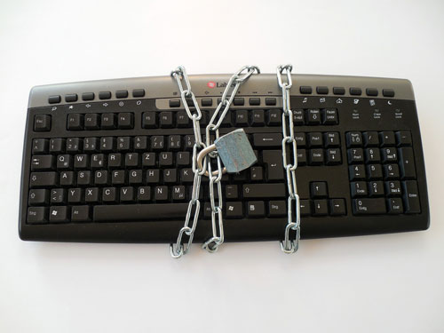 keyboard chained and padlocked