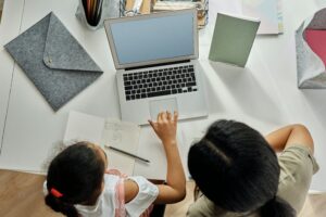 Child working at a laptop